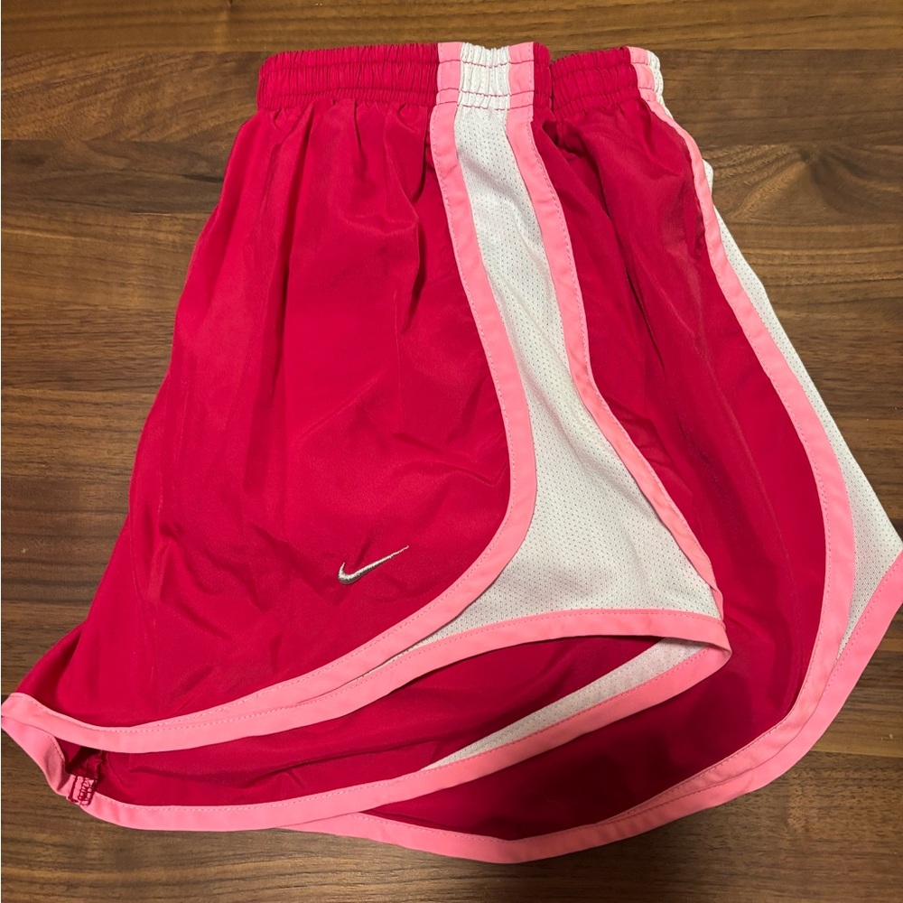 Pink Nike shorts in a mediun
